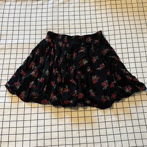 Brandy Melville black floral mini skirt
